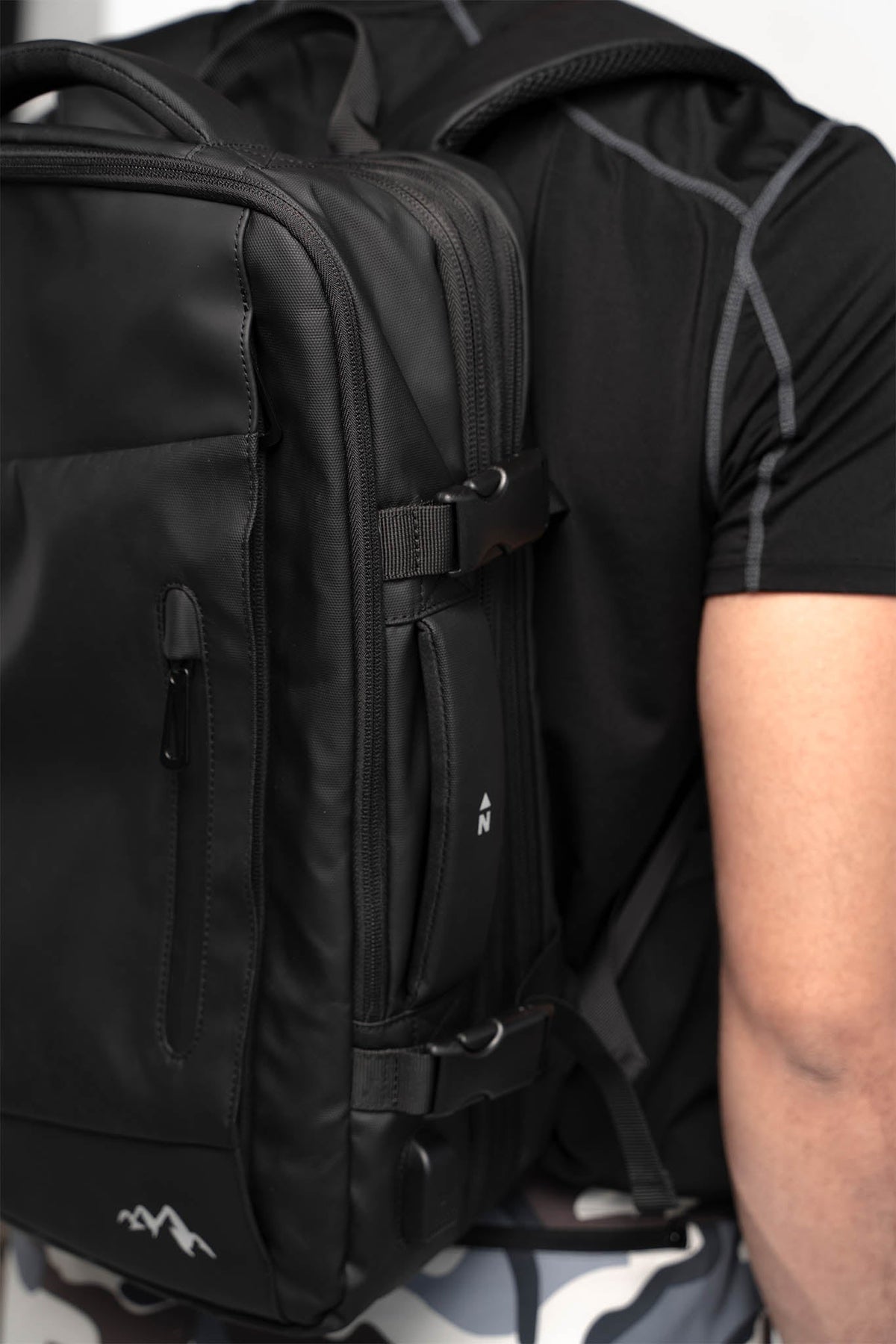 Nomad Voyager Expandable Travel Backpack With Built-In Rain Coat