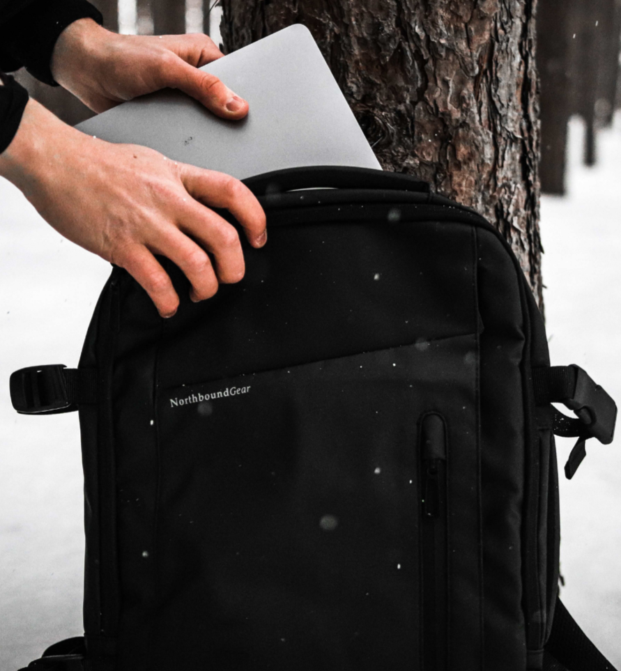 Nomad Voyager Expandable Travel Backpack With Built-In Rain Coat